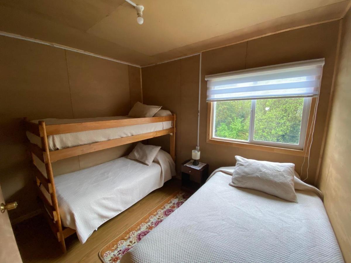 Hosteria Ensenada Puerto Puyuguapi Bagian luar foto
